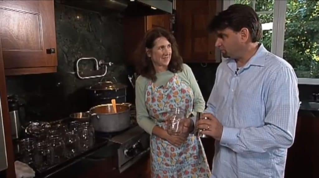 Home Canning with Nadine: A man and a woman preserving food in a kitchen.