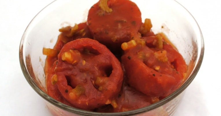 Italian Stewed Tomatoes in a glass bowl.