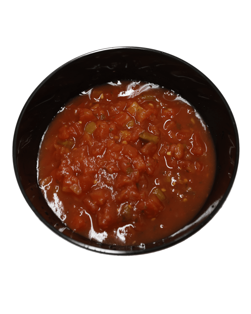 A bowl of diced tomatoes with green peppers on a white background.