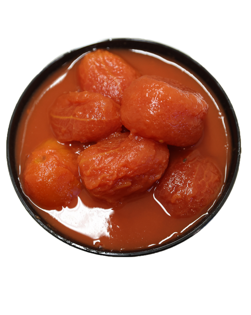 A bowl of ripe apricots on a white background with puree.