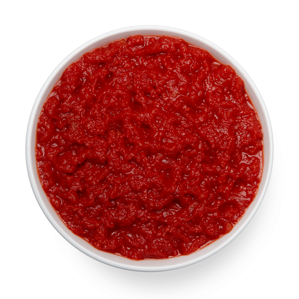 A bowl of organic red sauce made with crushed peeled tomatoes and tomato puree on a white background.