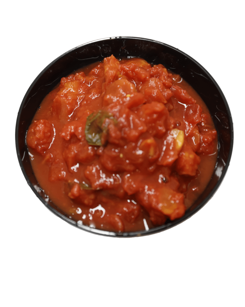 A bowl of tomato sauce with organic crushed tomatoes and dried basil.