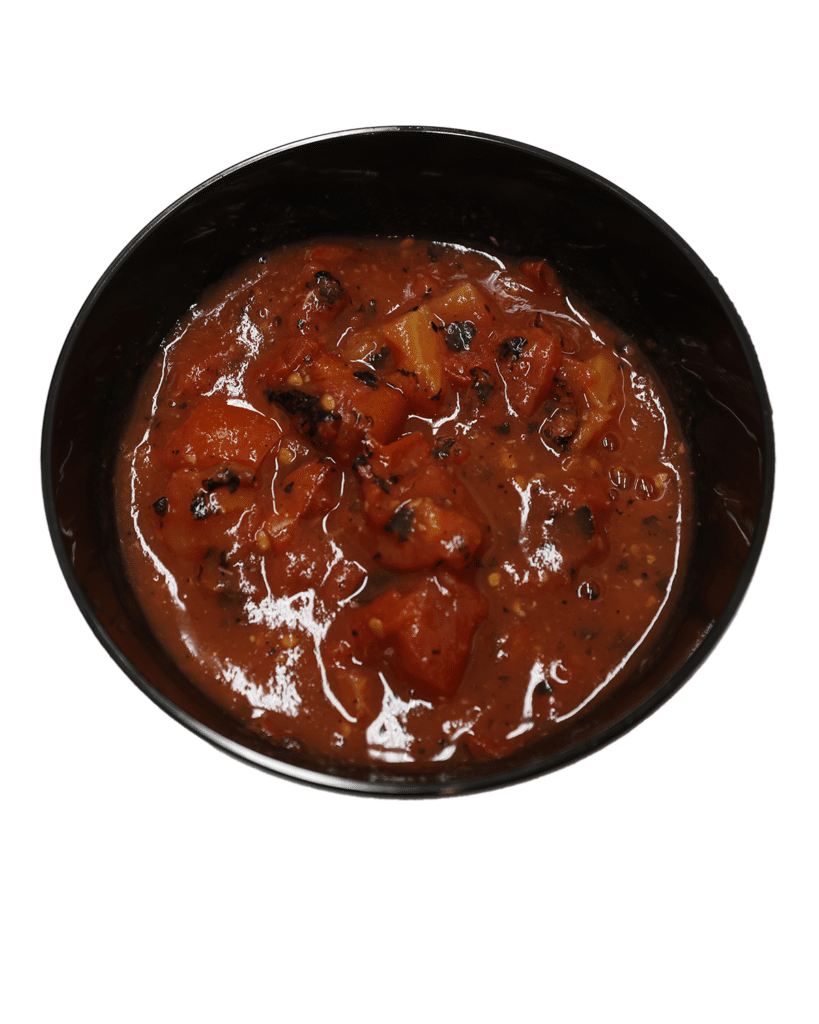 An image of a bowl of stew featuring #10 Fire Roasted Ready-to-Use Salsa on a white background.