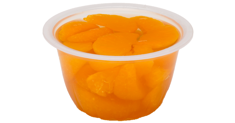 A cup filled with sliced apricots in 4 oz. Mandarin Oranges.