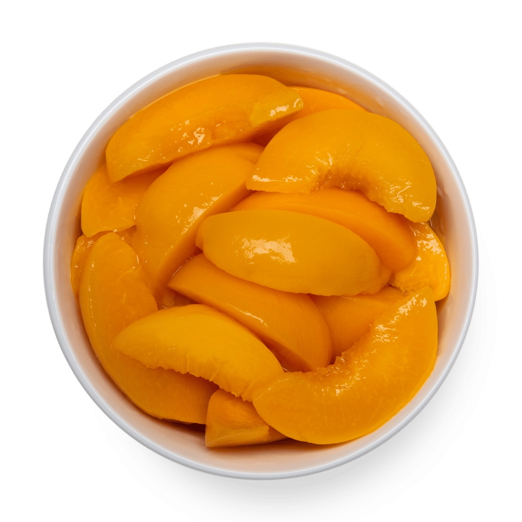 peach slices in white bowl overhead