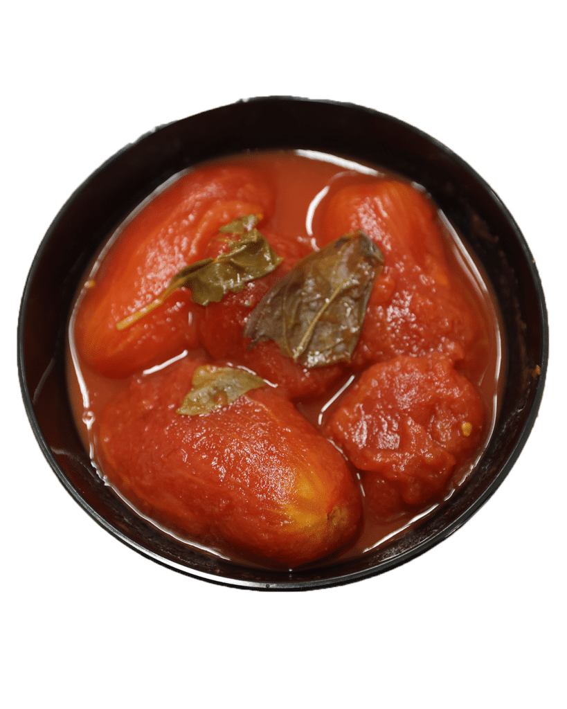 A bowl filled with Italian Style Whole Pear Tomatoes and Fresh Leaf Basil.