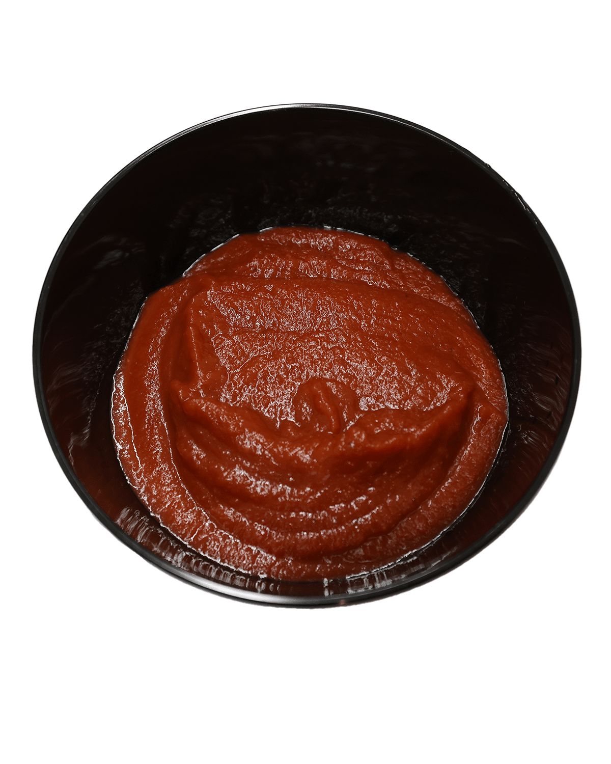 A white bowl of 1.06 tomato puree on a white background.