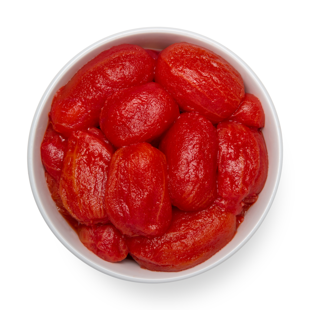 Tomatoes from Pacific Coast Producers in a bowl on a white background.