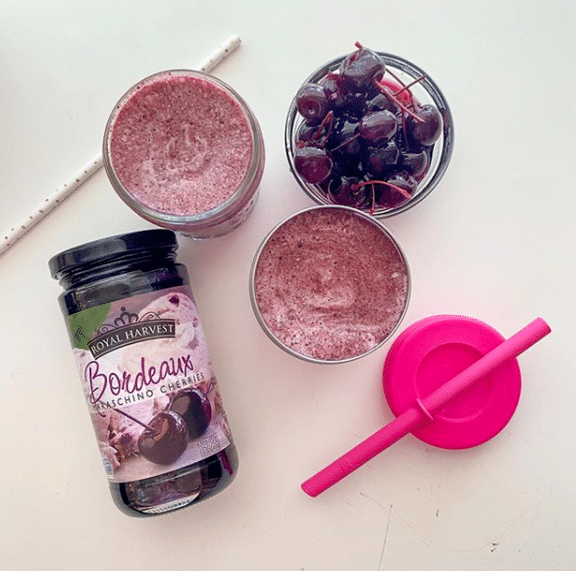 cherry berry smoothie with cherries on counter recipe photo