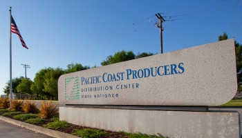 main entrance sign to pacific coast producers distribution center located in lodi, california