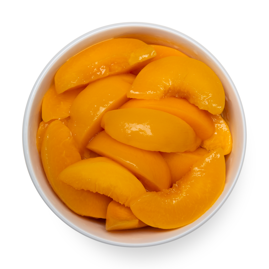 sliced canned peached in a bowl